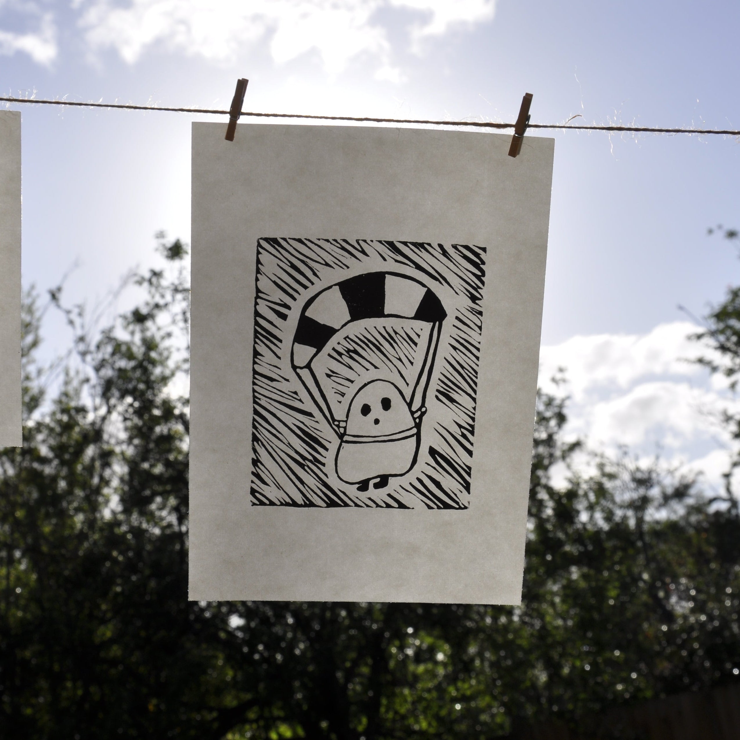 Ghostly Parachuting Linoprint